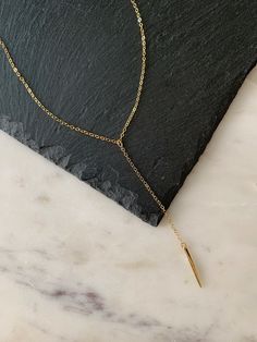 "This Y necklace is carefully handcrafted with a tiny amethyst teardrop in either 14k gold filled or sterling silver finish. The necklace comes with an extender and is adjustable up to 2\". M A T E R I A L S * & * S I Z E *Necklace is adjustable  *Pendant is heavy gold plated sterling silver vermeil  *Chain is 14k gold filled or sterling silver  How To Order: 1. Select your material. 2. Select your size; choose from: 12\"-14\" 14\"-16\" 16\"-18\" 18\"-20\" P R O D U C T I O N * T I M E S All ite Modern Minimal Jewelry, Chic Bracelet, Y Necklace, Jewelry Accessories Ideas, Jewelry Simple, Minimal Jewelry, Jewelry Unique, Layering Necklace, Long Pendant