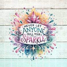 the words never let anyone dull in your sparkle on a wooden background with watercolor paint