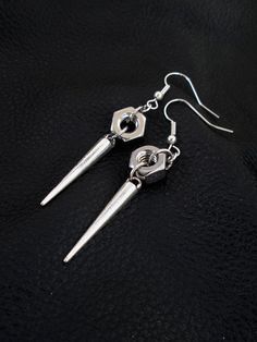 Nut spike earrings, silver tone industrial edgy hardware hex nut spike drop earrings Hex Nut Jewelry, Industrial Accessories, Industrial Earrings, Wire Crochet Jewelry, Hardware Jewelry, Wire Wrapped Jewelry Diy, Hex Nut, Goth Jewelry, Spike Earrings