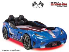 a blue sports car bed is shown with black leather seats and the words modela monalasa on it