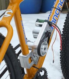 a close up of a bike in the snow