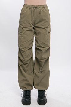 Discover comfort and versatility with these Olive Loose Fit Parachute Cargo Pants. With adjustable elasticated fastenings at the waist and ankles, you can be sure of a secure fit and superior styling. Experience the perfect balance of form and function. Fabric & fit: Model is wearing size Small. Loose Pullover, Oversized Style, Cargo Pants Women, China Fashion, Streetwear Women, Sheer Fabrics, Workout Pants, Cargo Pants, Short Tops