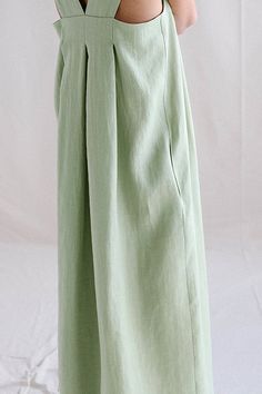 Square Neck Sleeveless Maxi Dress Solid Color Long Summer Dress, Spring Sleeveless Cotton Dress, Solid Cotton Sleeveless Dress For Spring, Solid Color Sleeveless Cotton Dress For Spring, Green Solid Sleeveless Dress For Spring, Spring Sleeveless Dress With Pockets, Green Sleeveless Dress For Spring, Spring Sleeveless Maxi Dress For Work, Spring Workwear Sleeveless Maxi Dress