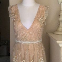 Very Nice And Unique Gown. Nude Gold With White Glitter. Looks Like Something J Lol Might Wear. It’s A Body Suit Dress Side Small Glitter V-neck Evening Dress For Wedding, V-neck Sequin Glitter Dress For Wedding, V-neck Glitter Evening Dress For Wedding, Wedding Evening Dress With Glitter V-neck, Wedding Evening Dress With Glitter And V-neck, Summer Wedding Dress With Glitter, Summer Wedding Glitter Dresses, Elegant Champagne Dress With Glitter, Elegant Champagne Glitter Dress