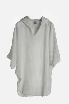 Our most beloved piece for summer. This one piece, super soft, cuddly poncho is perfect for the beach or at home over our Koza Pants. The cocoon like texture warms you up immediately. Easy to fold and take anywhere as it would not have wrinkles. Water absorbent and dries quickly. Oversized White Cover-up For Loungewear, Comfortable White Sleepwear For Vacation, Relaxed Fit Summer Loungewear Cover-up, Oversized Spring Poncho For Loungewear, Spring Loungewear Poncho With Batwing Sleeves, White Oversized Long Sleeve Cover-up, Oversized Cotton Poncho For Loungewear, Cozy One Size Poncho For Beach, Oversized Poncho With Batwing Sleeve For Vacation