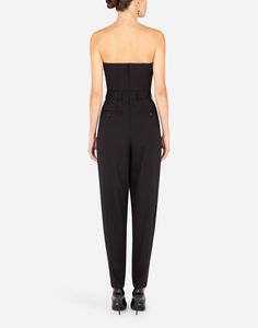 This strapless stretch wool jumpsuit by Dolce&Gabbana combines tradition and modernity, resulting in a timeless elegant piece. The bustier shape accentuates feminine silhouette, making it perfect choice for those who want to enhance their beauty. Made from high-quality wool, offers both style comfort. Dresses In Black, Short Loungewear, Suits Coats, Dolce & Gabbana, Coat Dress, Women's Dresses, All The Colors, Strapless Dress, Dolce And Gabbana