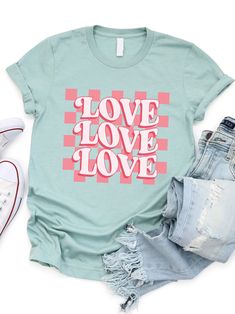 Collect yourself in the most fashionable way possible this season! Nothing says bring on the Valentine's Day like fun graphic tees! Pair this with your favorite high waisted jeans and boots for a fun holiday look! Sizing: Small 4-6 Medium 8-10 Large 12-14 XL 14-16 PROCESSING TIME: 5-7 business days **NOTE** If ordered with non-custom items, order will be held to ship with graphic tees. Casual Peach T-shirt With Graphic Print, Summer Peach T-shirt With Graphic Print, Spring Peach T-shirt With Graphic Print, Valentines Day Shirts For Women, Pink Valentine's Day Graphic Tee, Fun Graphic Tees, Trendy Heart Graphic T-shirt For Valentine's Day, Checker Background, Maxi Skirt Dress