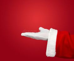 santa claus's hand with white glove on red background royalty images and clippings