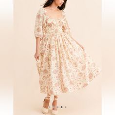 Free People Oasis Printed Ruffle Floral Gauzy Cottagecore Coquette Midi Dress Printed To Perfection, This Effortlessly Ethereal Midi Dress Is Featured In A Ruffle-Adorned Design With Smocking At Waist And Exaggerated Sleeves For Added Shape. Fit: Flowy, Relaxed Fitfeatures: Square Neckline, Smocking At Bodice, Side Pockets, Pleating Throughout, Fully Lined Skirtwhy We <3 It: The Perfect Pick For Any Occasion, This Darling Midi Was Designed To Be Dressed Up Or Down. Nwt Size: M Color: Ivory Combo Cottagecore Ruffle Hem Dress For Brunch, Cottagecore Midi Dress For Brunch, Cottagecore Ruffled Dresses For Brunch, Off White Ruffled Midi Dress For Daywear, White Feminine Prairie Dress For Spring, Feminine Prairie Dress With Ruffles For Garden Party, White Feminine Prairie Dress For Garden Party, White Dress With Gathered Neckline For Spring, White Prairie Dress With Ruffles For Spring