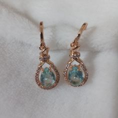 Blue Cz Water Drop Earrings 18k Gold Plated Blue Teardrop Earrings With Diamond Accents, Blue Teardrop Diamond Earrings For Gift, Blue Teardrop Diamond Earrings As Gift, Blue Topaz Teardrop Earrings, Elegant Blue Topaz Earrings With Ear Wire, Water Drop Earrings, Earrings Color, Water Drops, Water Drop