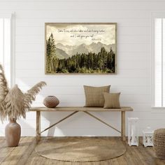 a room with a bench and some plants on the floor in front of white walls