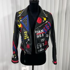 Nwt Nevada Love France Faux Vegan Studded Leather Moto Jacket Graffiti Print Black Small Material: 100% Polyurethane (Shell) 100% Polyester (Lining).This Product Is Asian Size. When You Buy It, Please Choose The Size That Is One Sizes Larger Than Your Usual Size, Otherwise It Will Be Very Small. Detailswomen's Leather Jacket,Front Asymmetrical Zipper Closure, Perfect Fit,Long Sleevestudded Rivet On Front Lapelsleeve,Shoulder And Back.Give You Unprecedented New Experience. Measurements (Flat): Bu Spring Black Biker Jacket With Graphic Print, Black Leather Jacket With Graphic Print For Fall, Spring Biker Jacket With Graphic Print, Trendy Leather Jacket With Graphic Print For Spring, Trendy Leather Jacket With Graphic Print, Trendy Long Sleeve Biker Jacket With Graphic Print, Edgy Long Sleeve Biker Jacket With Graphic Print, Black Biker Jacket With Graphic Print, Trendy Graphic Print Leather Jacket For Spring