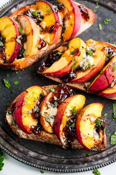 slices of toasted bread topped with sliced peaches