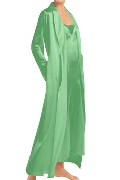 This mint green wrap dress is made of lustrous cupro silk and features an solid green, wrap maxi dress green, floor length wrap dress, at Kyle X Shahida. Wear it loose or cinch the belted waist to define your figure.Details: 100% Cupro Silk Long Sleeve Wrap Dress Shawl collar; wrap front Self-tie sash at waist Long Wrap Dress Relaxed Silhouette. Hem Falls Below Knees Mint Color Imported Dry Clean Gentle hand wash only Silk Maxi Dress In Solid Color, Green Draped Silk Maxi Dress, Green Silk Long Sleeve Maxi Dress, Green Satin Chic Maxi Dress, Chic Green Belted Maxi Dress, Spring Silk Wrap Maxi Dress, Silk Wrap Maxi Dress For Spring, Belted Silk Maxi Dress, Spring Long Satin Maxi Dress