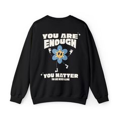 You Are Enough Sweatshirt, Mental Health Awareness Sweatshirt, Inspirational Sweatshirt, Trendy Y2K Sweater, Trendy College Crewneck Sweater ----------Sweatshirt Details---------- These garments are made from polyester and cotton. This combination helps designs come out looking fresh and beautiful. The collar is ribbed knit, so it retains its shape even after washing. There are no itchy side seams on these sweaters.  .: 50% cotton, 50% polyester .: Medium-heavy fabric (8.0 oz/yd² (271.25 g/m .: Band Merch Long Sleeve Sweatshirt With Slogan, Band Merch Sweater With Letter Print And Relaxed Fit, Long Sleeve Slogan Tops Band Merch, Casual Crew Neck Sweatshirt With Front Print, Relaxed Fit Crew Neck Sweatshirt With Front Print, College Crewneck, Sweatshirt Details, Sweatshirt Trendy, Y2k Sweater