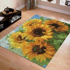 a sunflower rug on the floor in a living room