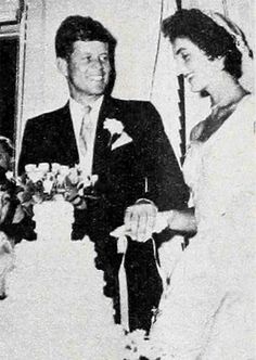 an old black and white photo of a bride and groom