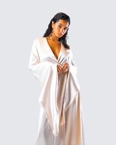 She’s boujee or whateva 👑 Made from satin fabric and complete with a tie belt and oversized bell sleeves, this robe will make you feel like a million bucks - even when you’re just lounging around 👏 Satin Robe With Kimono Sleeves For Party, Chic Satin Evening Robe, Chic Robe For Spring Parties, Chic Party Robe For Spring, Chic Spring Party Robe, Spring Party Satin Robe, Black Off Shoulder, Satin Maxi, Graphic Top