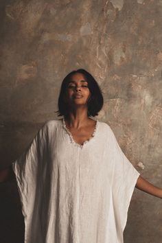 ‘Let There Be Peace’ our biggest dream. This kaftan is crafted from white organic flax linen with raw rustic edging to the neck and front split. We love the simplicity and message of this piece. The feeling of freedom One Size Cut for a relaxed fit. 100% Linen Dry Clean Only. Handmade by artisans. Female Portrait Photography, Dress Cream, Cream Dress, Sewing Clothes, Female Portrait, Resort Wear, Minimalist Fashion, Boho Fashion, Fitness Models