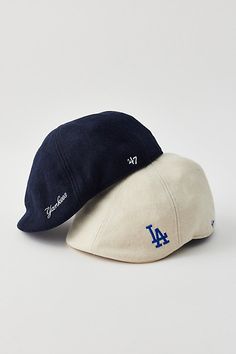 '47 Brand MLB baker boy hat in a fitted low-profile cap design complete embroidered MLB logos. Features '47 Brand MLB baker boy hat Fitted 47 Brand hat Wool blend with MLB logos Content + Care 50% Wool, 50% acrylic Spot clean Imported | '47 Brand MLB Baker Boy Hat in Los Angeles Dodgers, Women's at Urban Outfitters Baker Boy Hat, Mlb Logos, Hat Wool, Fashion Cap, Baker Boy, Boy Hat, Flat Cap, 47 Brand, Greek Life