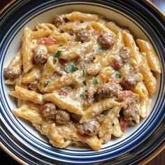 Slow Cooker Creamy Italian Sausage Pasta is a delicious and easy dish that combines savory sausage, creamy sauce, and pasta all in one pot. It's perfect for busy days when you want a comforting meal without a lot of fuss. Why Make This Recipe This recipe is great because it saves you time and effort. Pasta Ideas With Sausage, Pasta With Pork Sausage, Sausage Noodle Bake, Sausage Peppers Onions Pasta, Slow Cooker Ground Sausage Recipes, Slow Cooker Sausage Pasta, Crockpot Sausage Pasta Recipes, Crock Pot Sausage Pasta, Pasta Dishes With Italian Sausage