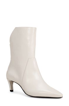 A notched back panel creates modern allure on a trend-right bootie framed by a pointy toe and kitten heel. 2" heel 8" shaft Leather upper/synthetic lining and sole Made in Brazil Coconut Cream, Kitten Heel, Boot Shoes Women, Vince Camuto, Mid Calf, Bootie, Nordstrom Rack, Knee High, Bootie Boots