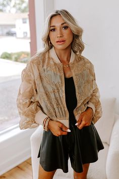 - This velvet burnout bomber jacket is the ultimate blend of luxe style and laid-back vibes. With its chic floral design and rich texture, it's the statement piece your wardrobe has been waiting for. Embrace main character energy with this trendy piece! - Unlined velvet burnout material with a floral pattern - A knit collar - A zip closure front - Long, loose sleeves with fitted knit cuffs - A relaxed silhouette that ends in a knit waistband Main Character Energy, Velvet Burnout, Luxe Style, Loose Sleeves, Lace Cutout, Iced Latte, Color Block Top, Knee High Leather Boots, Leather Shorts