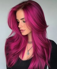 Curly hair in a bright flamingo pink, offering a bold and energetic look. Perfect for a vibrant and lively style. Bright Pink Hair Dark Roots, Pink Rose Hair Color, Pink Hair Costume Ideas, Underhair Color, Dyed Hair With Bangs, Bright Coloured Hair, Bright Hair Color Ideas, Neon Pink Hair