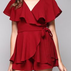 Boutique Romper Wine Red Never Used Size Small (Fits A Size Medium Too!) From Boutique Casual Red Ruffled Jumpsuits And Rompers, Casual Red Jumpsuits And Rompers With Ruffles, Red V-neck Jumpsuit And Romper, Red Chic Jumpsuits And Rompers With Ruffles, Chic Red Jumpsuit With Ruffles, Chic Red Short Sleeve Jumpsuits And Rompers, Red Solid Color Jumpsuits And Rompers For Summer, Red Jumpsuits And Rompers For Summer, Red Solid Color Jumpsuits And Rompers For Spring