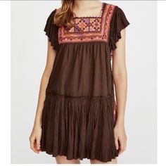 Nwt Free People Boho Embroidered Brown Gauzy Open Back Dress Square Neck Size: Medium Look Fashionable And Captivating In This Nwt Free People Boho Embroidered Brown Gauzy Open-Back Dress Featuring A Square Neckline. Its Lightweight Design And Airy Fabric With Beautiful Intricate Embroidery Adds Versatility To Any Look. Its Open Back Adds An Alluring Detail, While Its Comfortable Fit Allows For Easy Movement. Be Confident For Any Occasion And Put The Finishing Touch On Your Outfit With This Soph Brown Embroidered Cotton Dresses, Brown Peasant Style Dress, Brown Peasant Summer Dress, Bohemian Embroidered Mini Cotton Dress, Bohemian Embroidered Cotton Dress In Mini Length, Bohemian Cotton Embroidered Mini Dress, Bohemian Embroidered Mini Dress With Short Sleeves, Bohemian Mini Dress With Embroidered Hem, Bohemian Embroidered Mini Dress