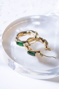 Size: 25.3 mm Weight: 16.8 g Plating material: 18k Gold Decoration: Emeralds Pin Material: Sterling Silver 925Gold plated on Jewelry brass/silverDelivered in Zinfu Fine Jewelry Package. Green Formal Hoop Earrings, Formal Green Hoop Earrings, Formal Plated Hoop Jewelry, Small Hoop Jewelry With Plating As Gift, Small Hoop Green Earrings Tarnish Resistant, Small Hoop Green Tarnish-resistant Earrings, Green Small Hoop Earrings Tarnish Resistant, Small Hoop Jewelry As Gift With Plating, Green Tarnish Resistant Small Hoop Earrings