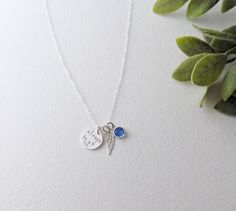 Petite remembrance necklace in sterling silver. It includes one 1/2" (12.5mm) charm with "always in my ♥", angel wing charm measuring 6x15mm, birthstone crystal and chain in your choice of length. Birthstone month can be typed in the personalization box. All components with the exception of the crystal are solid sterling silver. Sterling Silver Charm Necklace For Memorial, Personalized Sterling Silver Charm Necklace For Memorial, Dainty Sterling Silver Charm Necklaces For Keepsake, Memorial Sterling Silver Round Pendant Charm Necklace, Sterling Silver Round Pendant Charm Necklace For Memorial, Sterling Silver Birthstone Necklace For Memorial, Silver Birthstone Necklace With Birth Flower Pendant, Sterling Silver Round Charm Necklace For Memorial, Remembrance Necklaces