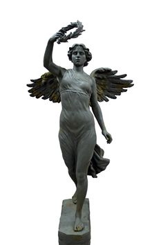 a statue of an angel holding a branch in its right hand, with wings outstretched