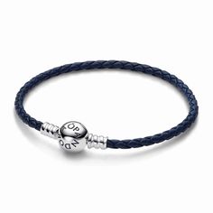 Channel the depths of the ocean and the calm of a midnight sky. The Pandora Moments Round Clasp Blue Braided Leather Bracelet is crafted from deep blue braided leather and finished with a round sterling silver clasp and threaded sterling silver end caps. Style it with up to 9 charms or dangle charms to perfectly offset your favorite charms. Dangle Bracelet, Bracelet Pandora, Midnight Sky, Braided Leather Bracelet, Mesh Bracelet, The Calm, Dangle Charms, Pandora Bracelet, Blue Bracelet