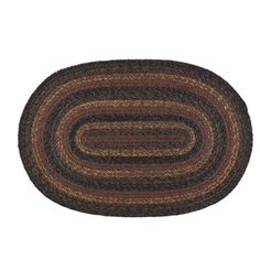 a brown and black oval rug on a white background