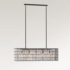 a rectangular chandelier hanging from a ceiling