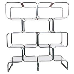 a metal shelf with several shelves on it