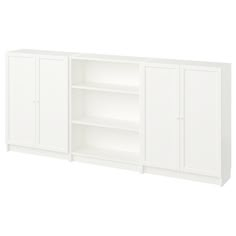 a white bookcase with three doors and two shelves on each side, in front of a