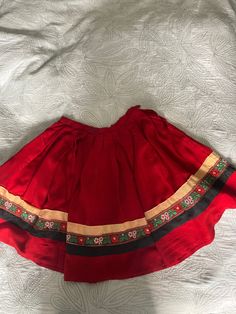 Vintage red cotton skirt a theatrical Item believed to date from 1950 era . Waist measures flat 11 inches ,length 17 inches . Skirt handmade by costume department. I'm guessing for a 6/7 year old . Original old fastenings . Vintage Full Skirt For Costume, Red Flared Cotton Skirt, Red Cotton Flared Skirt, Festive Red Flared Skirt, Traditional Red Lined Skirt, Retro Red Cotton Skirt, Traditional Red Flared Skirt, Traditional Red Cotton Skirt, Retro Red Full Skirt