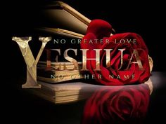 a red rose sitting on top of an open book with the words yeshuaa next to it