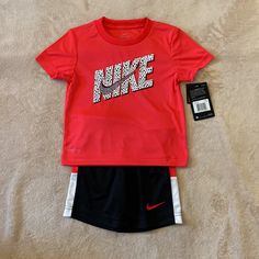 Nike Boys Outfit Size 3t. Short Sleeve Shirt And Shorts. Red Shirt And Black Shorts. Brand New! Nike Red Playwear Sets, Red Sporty Playtime Sets, Sporty Red Playwear Set, Red Sporty Playwear Sets, Nike Boys Outfits, Girls Nike Outfits, Nike Galaxy, Bodysuit With Shorts, Nike Set