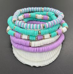 Set of 5 clay heishi stretch bracelets. Bracelets are 7" each. Stackable Beaded Bracelets, Clay Bracelets, Heishi Bracelet, Homemade Bracelets, Clay Bracelet, Homemade Jewelry, Bracelet Ideas, Heishi Beads, Stretch Bracelets