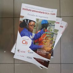 three pamphlets are stacked on top of each other in front of a tile floor with the words institute univeristial u c e centre