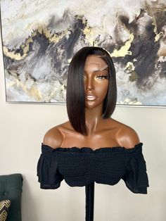 Beginner-friendly and is constructed using 100% virgin hair extensions that will last you years with proper care. Our units are glue-less and come ready to wear straight out the box. Add your lace tint or makeup to the lace and go. No salon needed! This wig will last you years with proper care. Perfect for Queens who love a short cut. PRE-ORDER UNIT. This means that your wig will be made custom just for you after your order placement. please allow up to 14 business days for processing (excludes weekends and holidays). Your order will be shipped after the processing period.    Sizes Available: XS, S, M, L, & XL. Please measure the circumference of your head before purchasing. All sales are final. Hair Type: 100% virgin hair extensions Texture: Straight Style: Bob Wig Lace: 4x4 Transparent L Style Bob, Wig Bob, Wig Lace, Lace Closure Wig, Short Cut, Closure Wig, Bob Wig, Human Hair Wig, Short Cuts