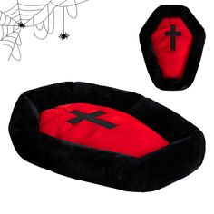 a red and black dog bed with a cross on it