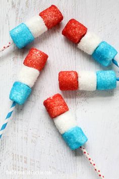 four red, white and blue marshmallows on sticks