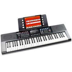 the electronic keyboard has an mp3 player attached to it