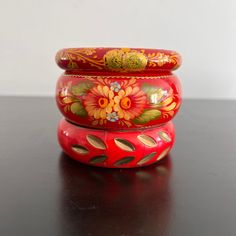 A lovely trio of vintage red bangles . All three feature floral designs . Excellent vintage condition, no chips, cracks or repairs. Wider 3 cm Wide Medium 2.5 cm Wide Narrow 1 cm Wide Thanks for visiting! Enamel Dishes, Red Bangles, Vintage Bangle Bracelets, Vintage Bangles, Bangles Bracelets, Red Bracelets, Boho Gifts, Floral Designs, Hippie Boho