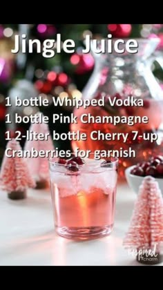 a bottle of pink champagne with cranberries for garnish