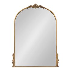 an ornate gold framed mirror on a white background